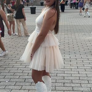 Tan colored dress worn once to Taylor Swift concert. Pd $85